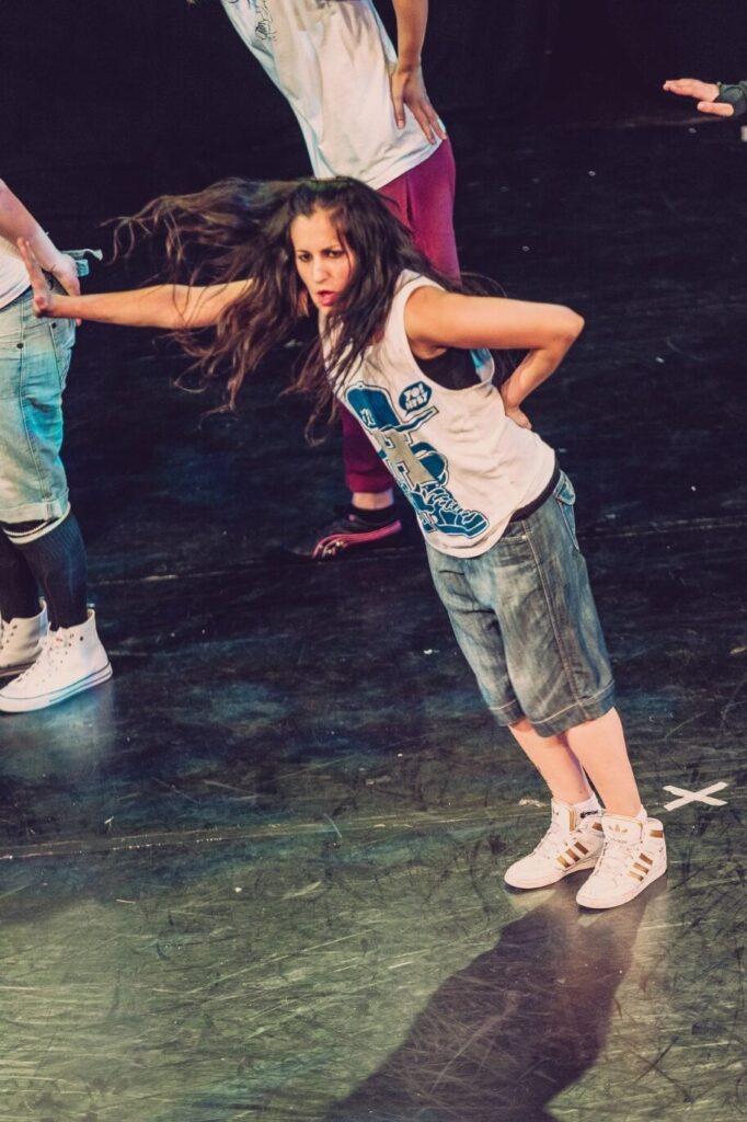 Laura dancing in a team